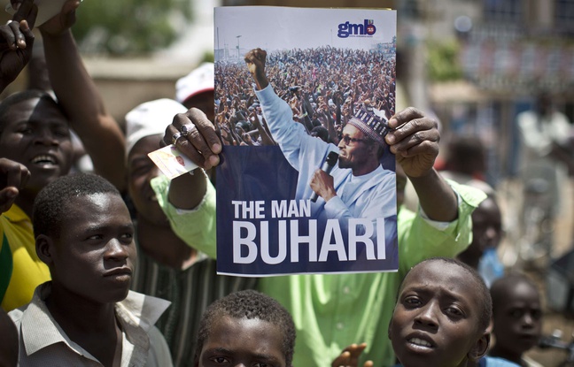 648x415_nigerians-soutiennent-candidat-muhammadu-buhari-candidat-election-presidentielle-30-mars-2015