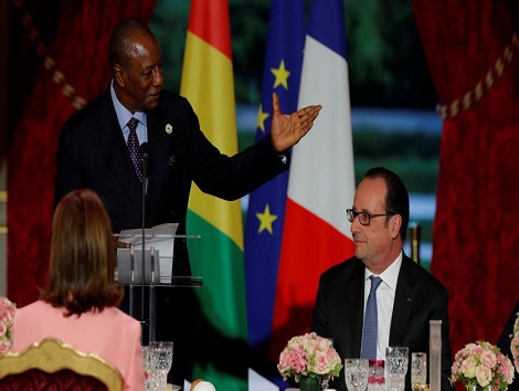 Feature image Alpha Condé et François Hollande lors d'un dîner à l'Elysée