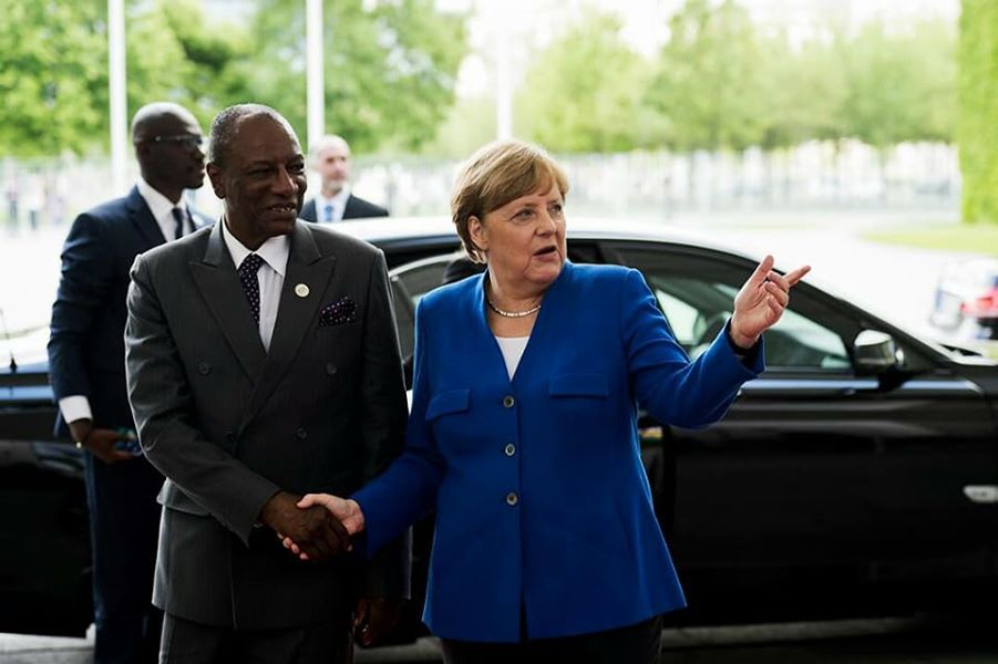 Feature image Alpha Condé et Angela Merkel
