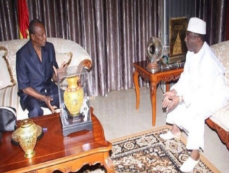 Alpha Condé, le Président guinéen et son haut représentant Sidya Touré