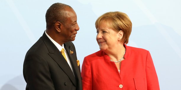 Alpha Condé, Président de la République de Guinée et la Chancelière allemande Angela Merkel