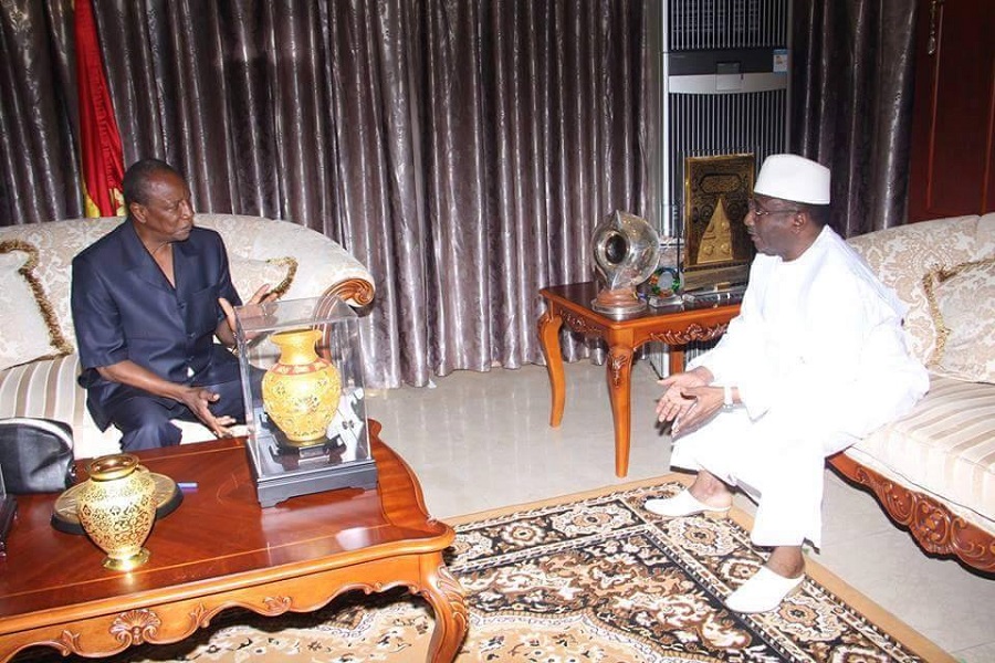 Alpha Condé, président de la République de Guinée et Sidya Touré, leader de l'UFR