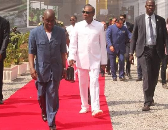 Alpha Condé, président de la République de Guinée en compagnie de Dr Mohamed Diané, ministre d'Etat à la Défense